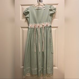 Rare Editions dress with ribbon flower and bow trim.